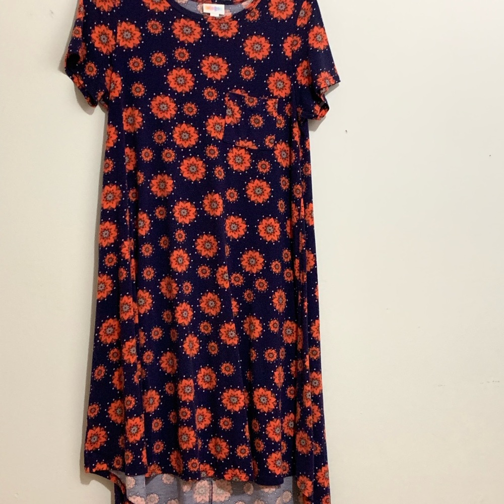 Used LulaRoe Carly with pocket size S. Navy with orange flowers.